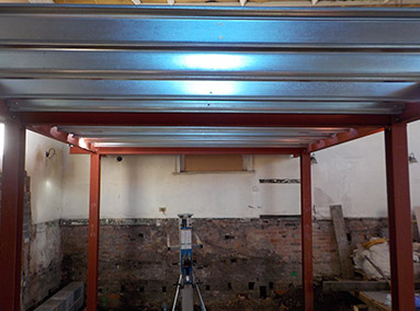Insertion of Floor Beams into Mezzanine Renovation by Gavin Edmondson Solicitors