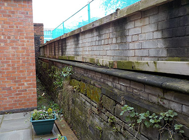 Deconstruction of the Rear Retaining Wall Renovation by Gavin Edmondson Solicitors
