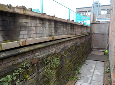Deconstruction of the Rear Retaining Wall Renovation by Gavin Edmondson Solicitors