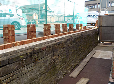 Construction of rear Elevation Wall Renovation by Gavin Edmondson Solicitors