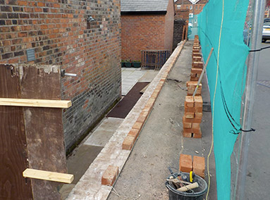 Construction of rear Elevation Wall Renovation by Gavin Edmondson Solicitors